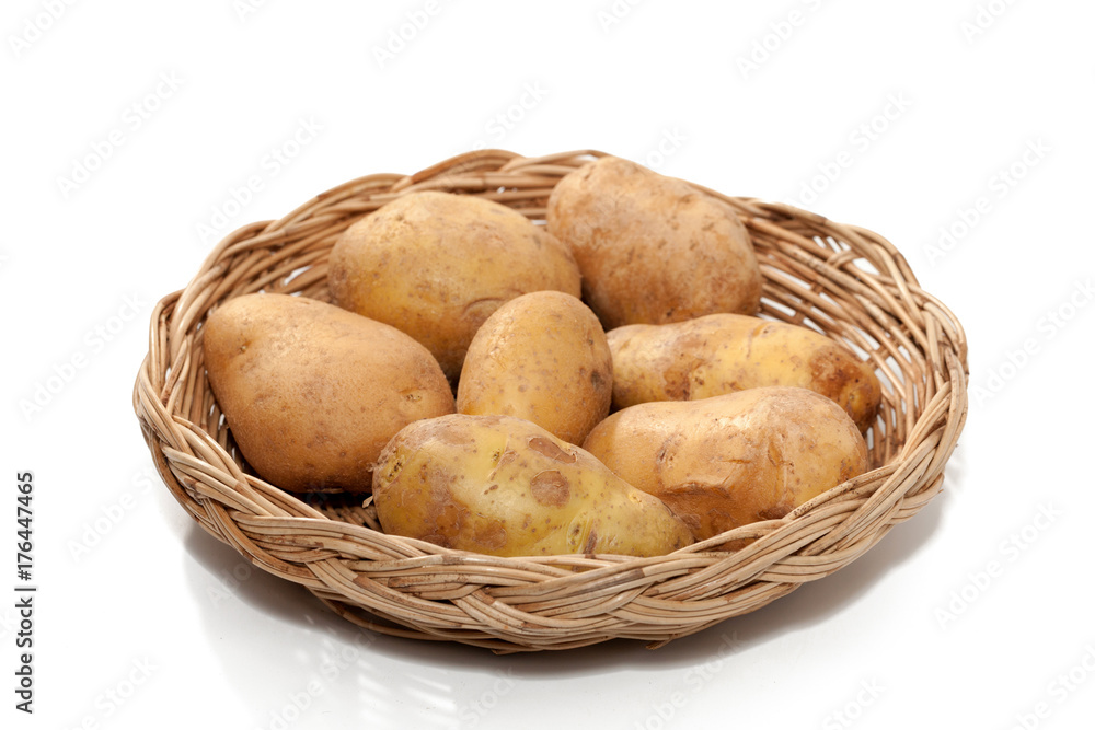 potato on basket isolated on white background potato on basket isolated on white background