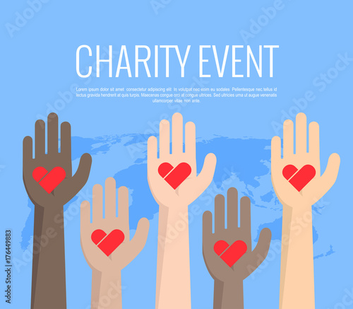 Charity event, hands raised in different colors, heart in the palm of your hand