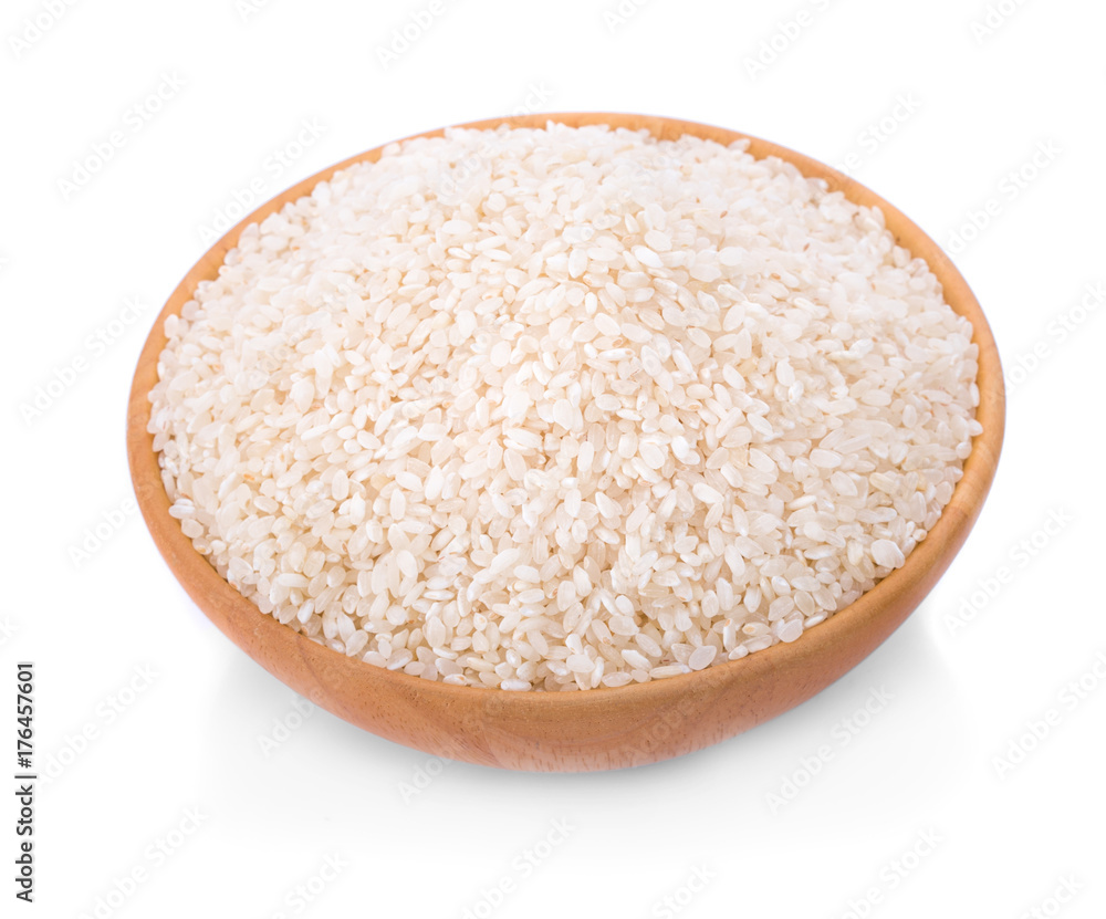 Japanese rice in a wooden on a white background Japanese rice in a wooden on a white background