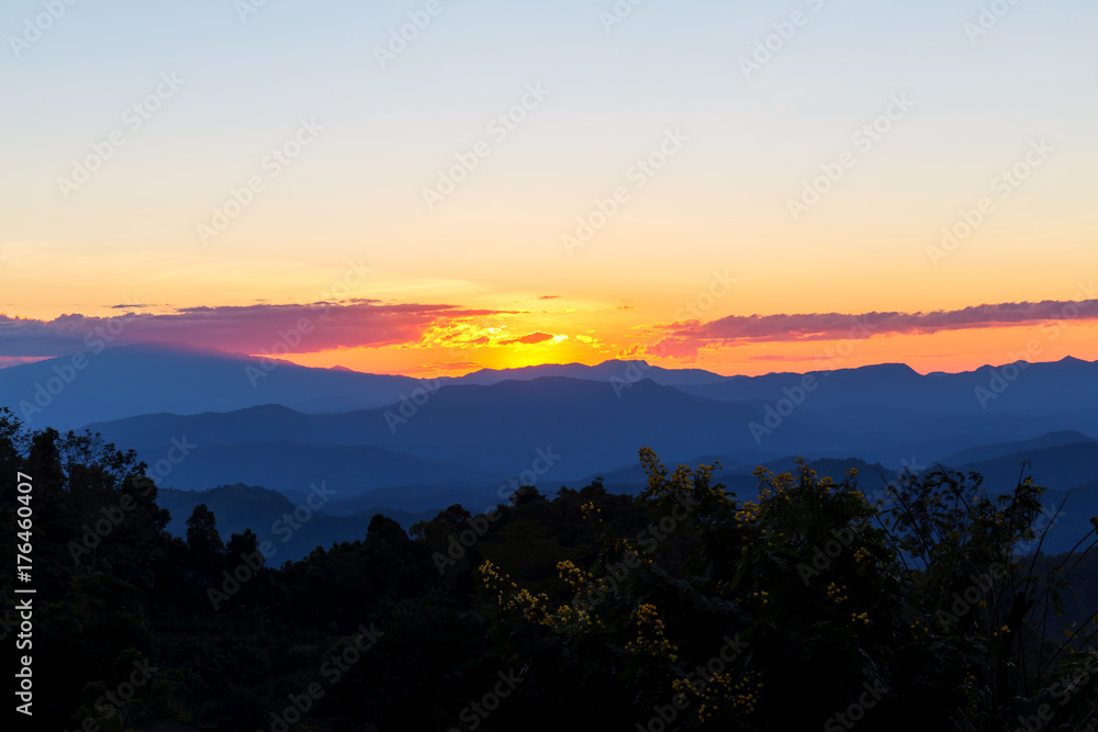 sunset and layer of mountain
