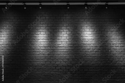 black brick wall background with light bulb Stock Photo | Adobe Stock
