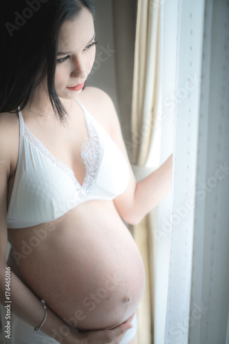 Pregnant young woman in happy time waiting for the gift of life wil coming soon Free Download Pregnant young woman in happy time waiting for the gift of life wil coming soon - GFXLoad