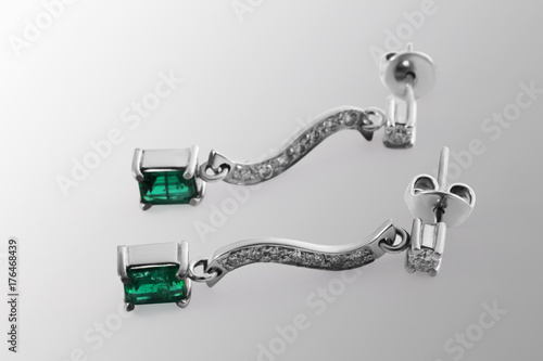 emerald earrings in gold with diamonds and gemstone