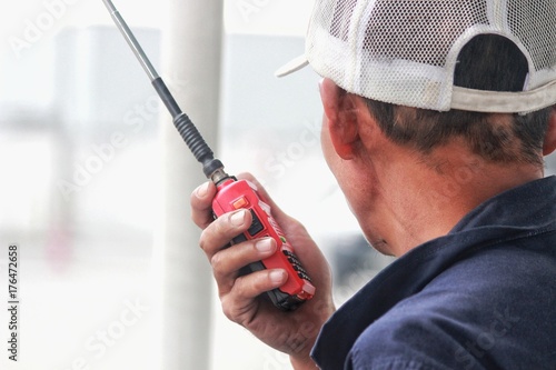 Worker using radio comunications photo