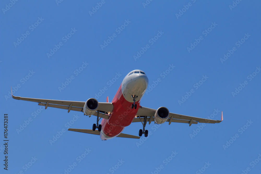 Passenger Airplane Taking Off Into The Blue Sky Passenger Airplane Taking Off Into The Blue Sky