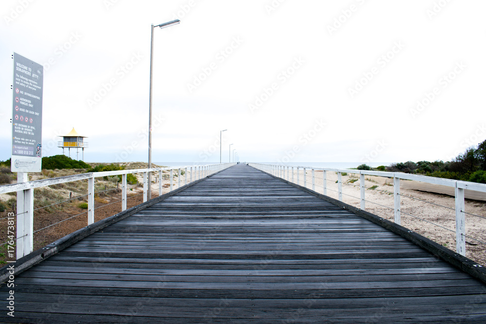 Very long jetty looking out to sea