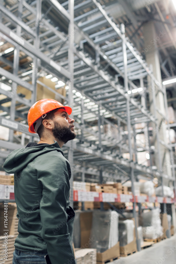 wholesale, logistic, people and export concept - manager or supervisor with tablet at warehouse wholesale, logistic, people and export concept - manager or supervisor with tablet at warehouse