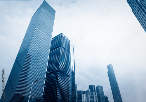 directly below of modern financial skyscrapers in central Hong Kong,blue toned,china.