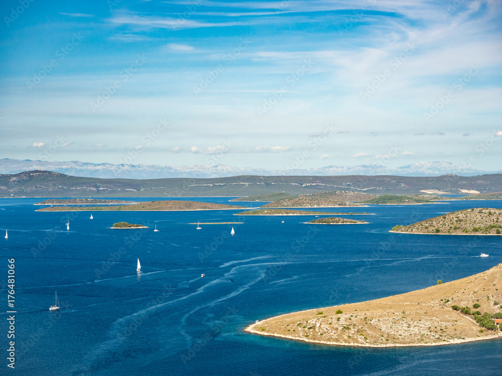 Aerial panoramic view of islands in Croatia with many sailing yachts between, Kornati national park landscape in the Mediterranean sea