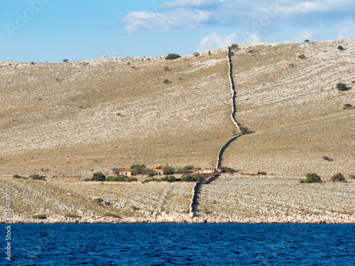 Sailing on a yacht along an island village in Croatia, farming alone on an empty desert island, Kornati national park