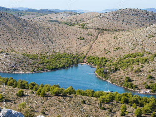 Aerial panoramic view of islands in Croatia with many sailing yachts between, Kornati national park landscape in the Mediterranean sea