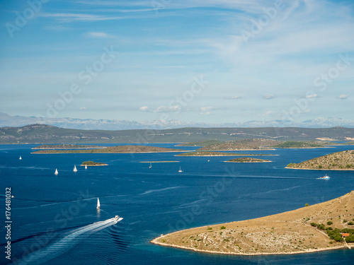 Aerial panoramic view of islands in Croatia with many sailing yachts between, Kornati national park landscape in the Mediterranean sea