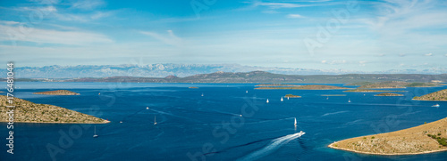 Aerial panoramic view of islands in Croatia with many sailing yachts between, Kornati national park landscape in the Mediterranean sea