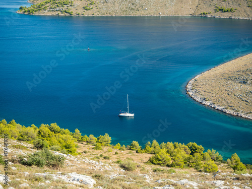 Aerial panoramic view of islands in Croatia with many sailing yachts between, Kornati national park landscape in the Mediterranean sea