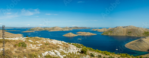 Aerial panoramic view of islands in Croatia with many sailing yachts between, Kornati national park landscape in the Mediterranean sea