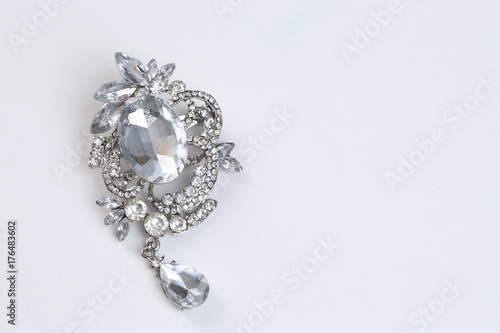 brooch with silver flowers and jewellry Fototapete