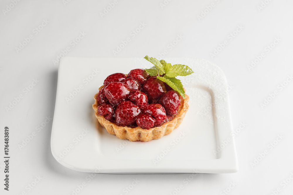 Raspberry pie on a white plate Raspberry pie on a white plate