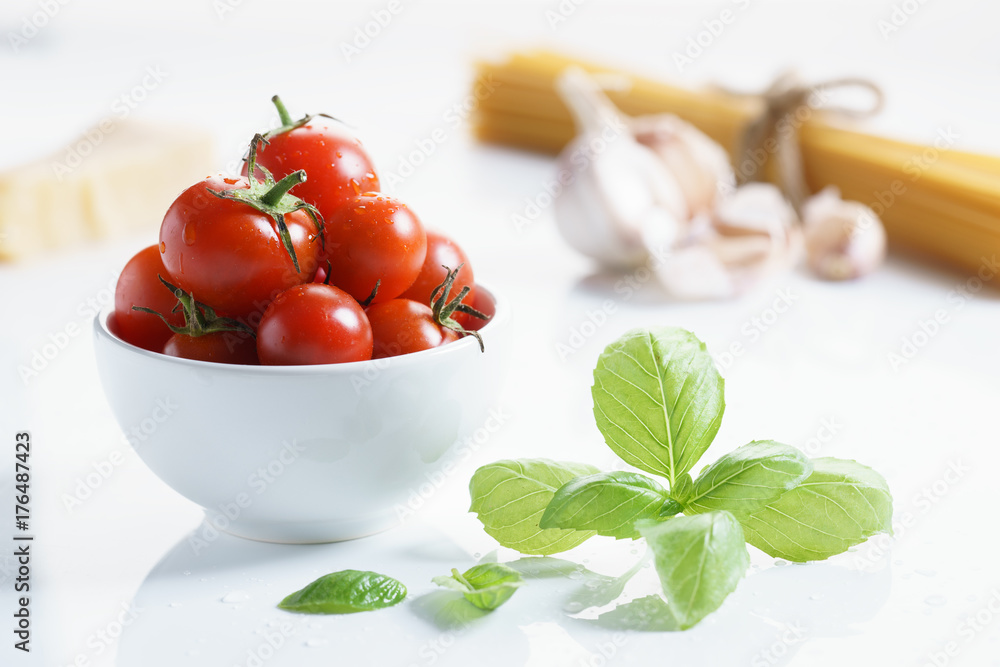 fresh tomatoes, herbs and spices on white background. fresh tomatoes, herbs and spices on white background.