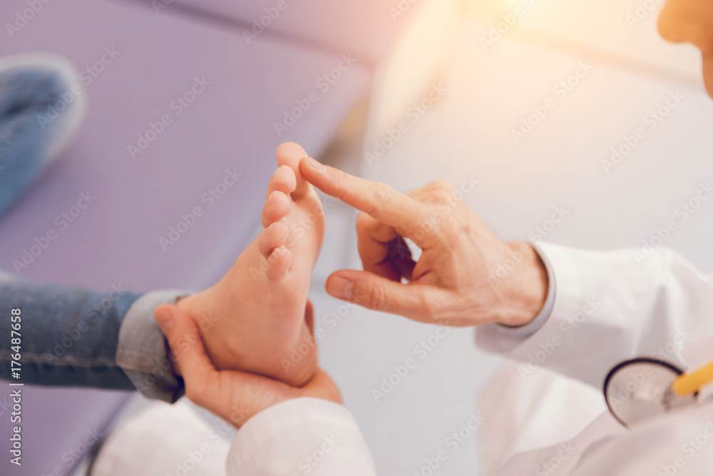 Close up of male hand that examining patient