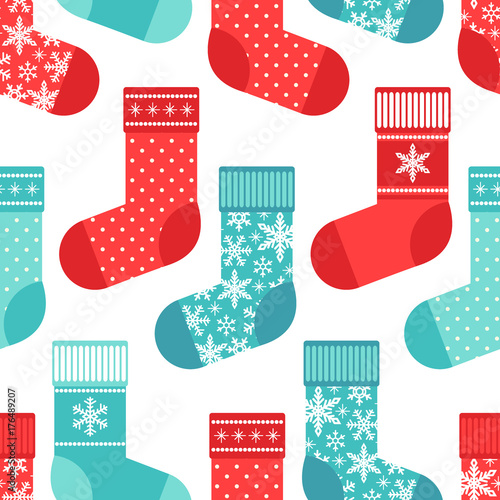 Cute winter seamless pattern with socks in traditional colors