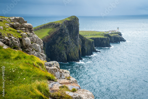 Obraz na plátne Scenic sight of Neist Point Lighthouse and cliffs in the Isle of Skye, Scotland