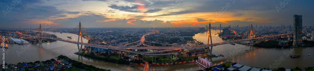 Bangkok Expressway top view, Top view over the highway,expressway and motorway at night, Aerial view interchange of a city, Shot from drone, Expressway is an important infrastructure in Bangkok.