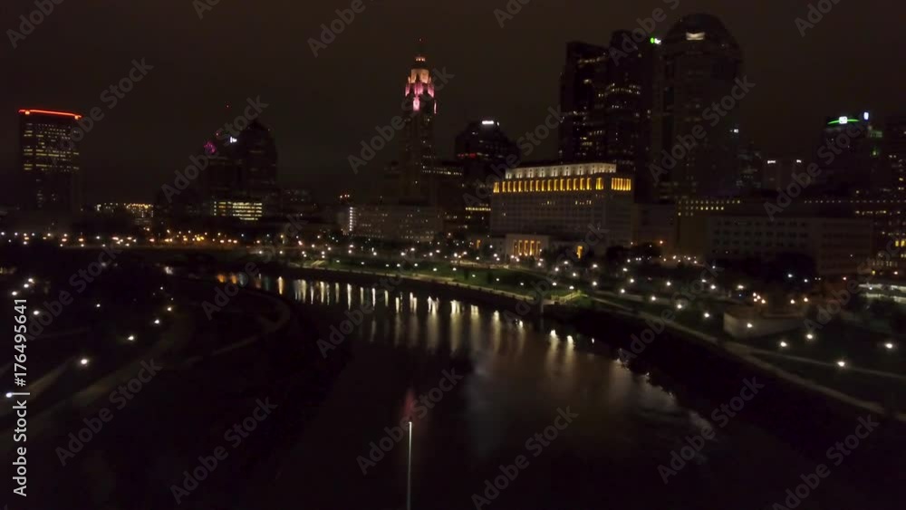 night view of downtown Columbus Ohio skyline flying backwards over Rich St. & Main St. Bridges night view of downtown Columbus Ohio skyline flying backwards over Rich St. & Main St. Bridges