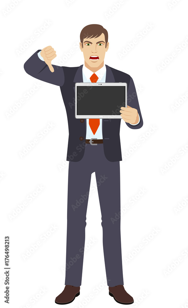 Businessman showing blank digital tablet PC and showing thumb down gesture as rejection symbol