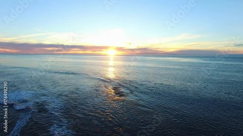 Pacific ocean and coast at sunset photo