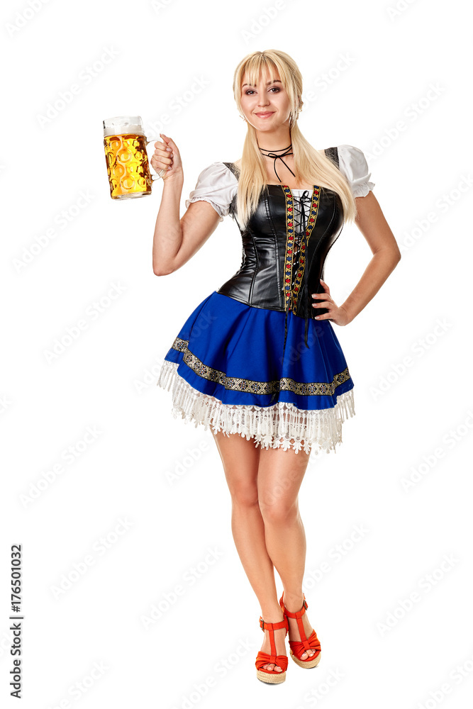 Full length portrait of a blond woman with traditional costume holding beer glasses isolated on white background. Full length portrait of a blond woman with traditional costume holding beer glasses isolated on white background.