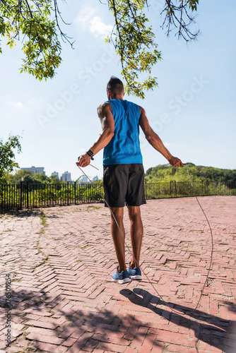 sportsman jumping on skipping rope