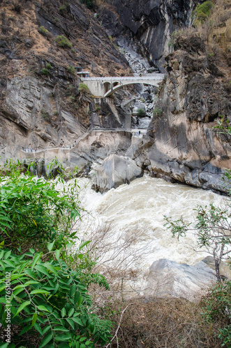 The torrential flow through the hills photo