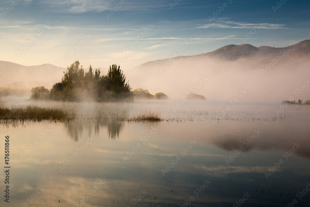 Misty Autumn morning on Lake Cerknica, Sloveni
