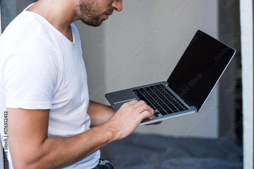 man using laptop man using laptop
