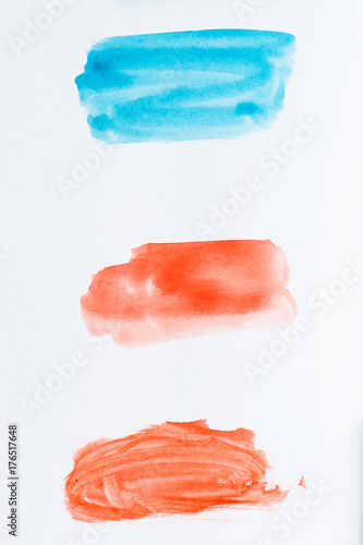 Set of watercolor brush strokes of blue and red paint on white background. Watercolor texture