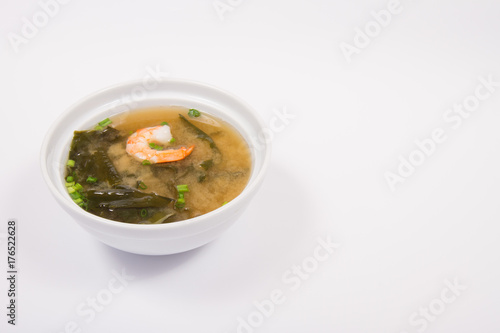 Japanese miso soup in a white bowl, close-up