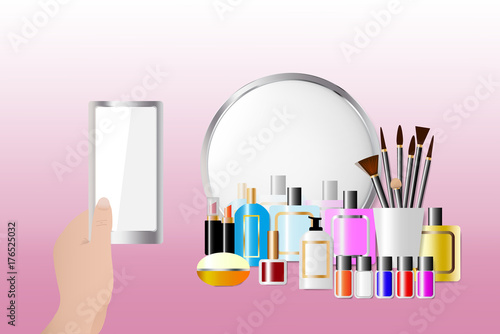 Cosmetic accessories standing in front of a mirror on the pink background. Female hand is holding a smart phone with empty screen ready for your text. All potential trademarks are removed.
