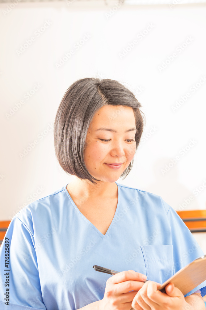 Confident asian nurse in hospital