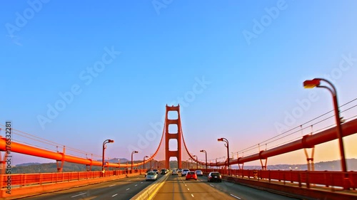 Driving on Golden Gate Bridge, suspension bridge between San Francisco Bay and Pacific Ocean, links peninsula to Marin County, carries Route 101 and California State Route 1, symbol of United States