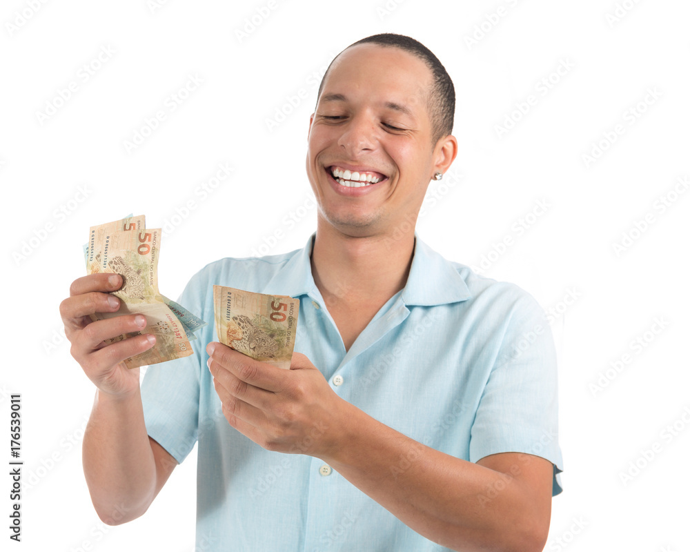 Man holds money. Friendly and fun Latin American. White background.. Man holds money. Friendly and fun Latin American. White background..
