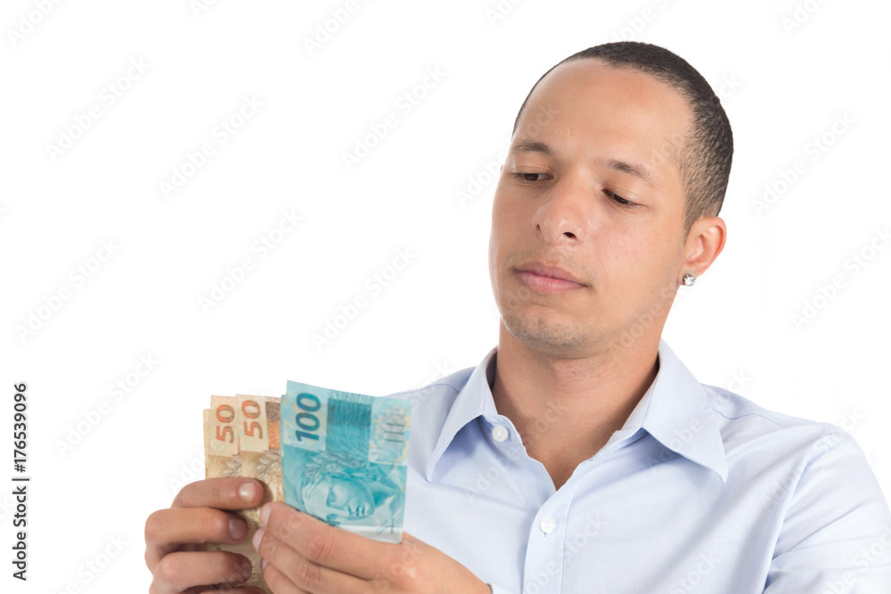 Young man counts the money. Young man counts the money.