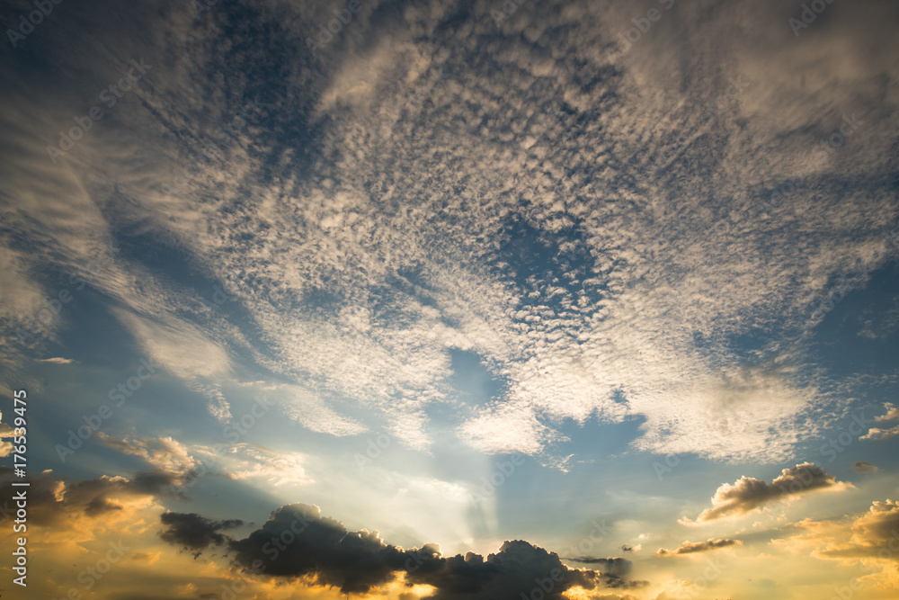 Fototapeta premium Sun rays through clouds like an dramatic explosion , power nature background.