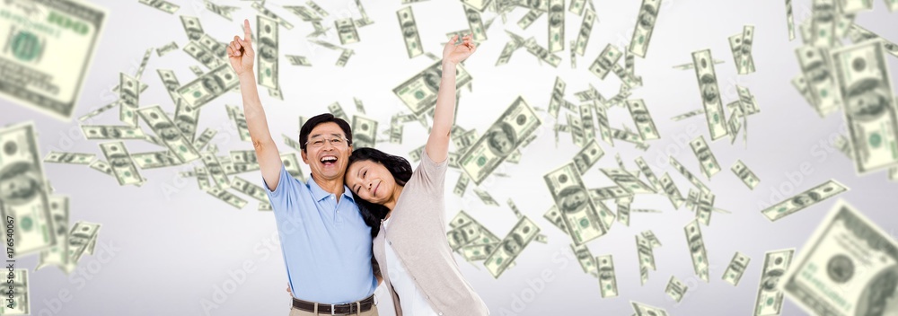 Composite image of smiling couple holding each other Composite image of smiling couple holding each other