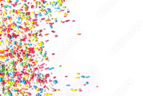 Colorful candy sprinkles isolated on white background