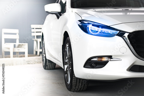 Fotografija BANGSAN, THAILAND - OCTOBER, 13, 2017 :  Led headlight car mazda brand japan parked in showroom of thailand for customers