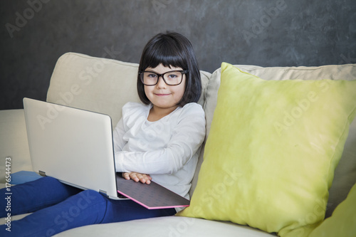 Black hair little girl with...