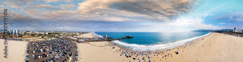 Panoramic aerial view of Santa Monica Pier, Parking and Cityscape