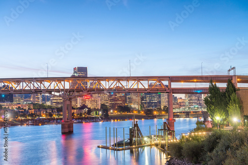 Beautiful night view of Downtown Portand and Willamette River reflections photo