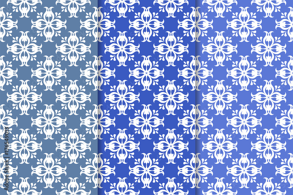 Set of floral ornaments. Vertical blue seamless patterns Set of floral ornaments. Vertical blue seamless patterns