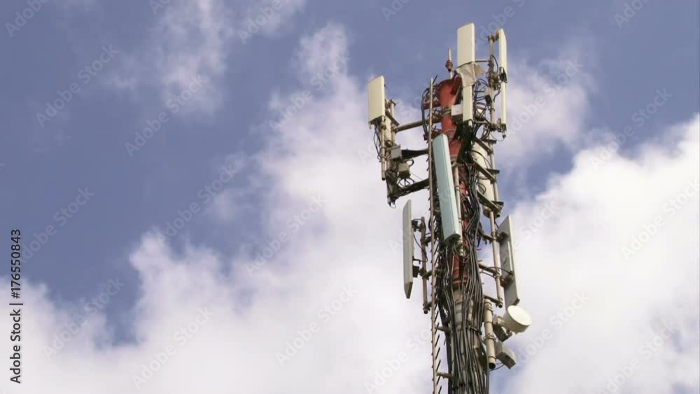 Clouds passing by cellular antennas tower time lapse Clouds passing by cellular antennas tower time lapse